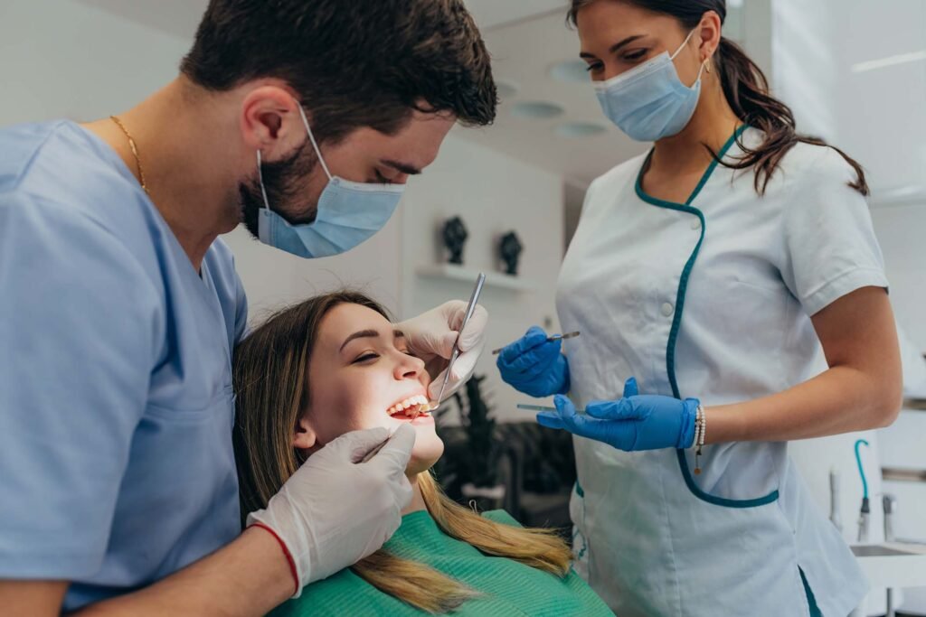 woman-patient-in-dental-clinic-being-examined-by-a-TUR3YJD.jpg